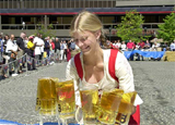 A woman bearing five beers at Oktoberfest-Zinzinnati
