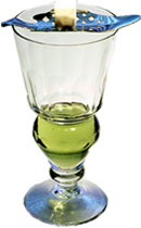 Traditional Melting Spoon and Sugar Cube Over Glass of Absinthe