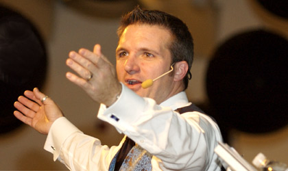 Greg Quiroga, auctioneer