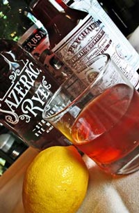 A Sazerac with assorted ingredients